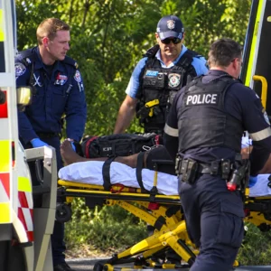 Emergency responders near an ambulance