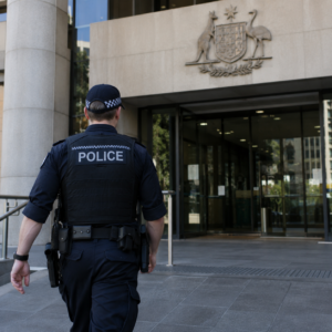 Police officer outside Australian court