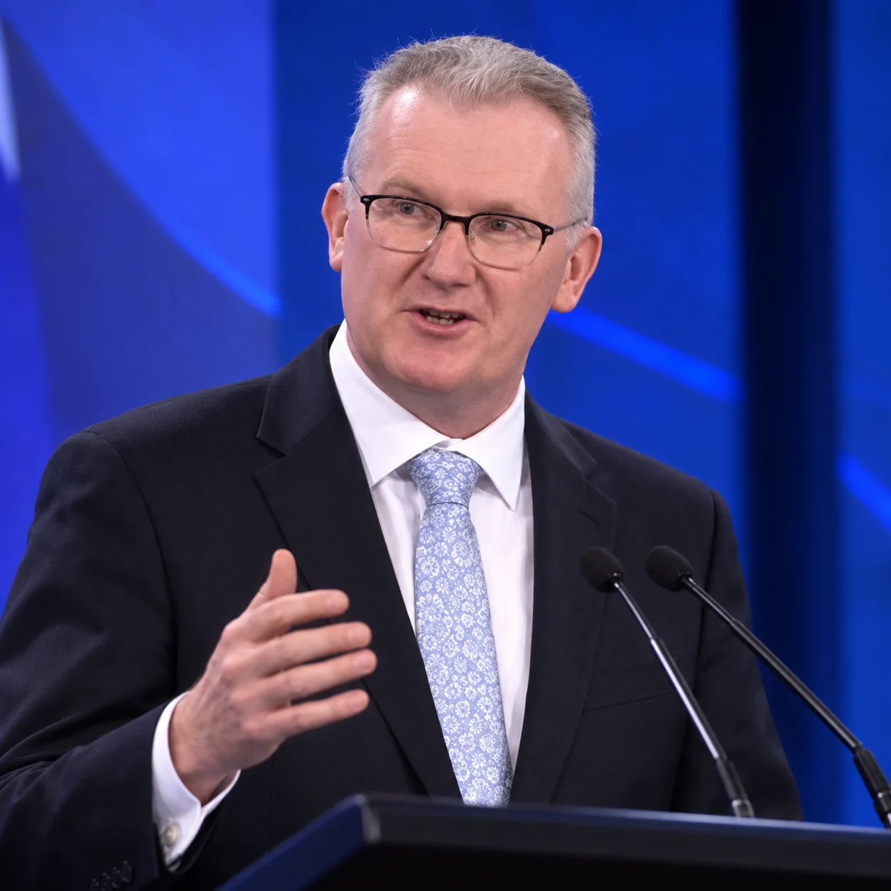Tony Burke speaking at a lectern
