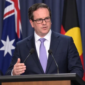 Australian minister speaking at a press conference